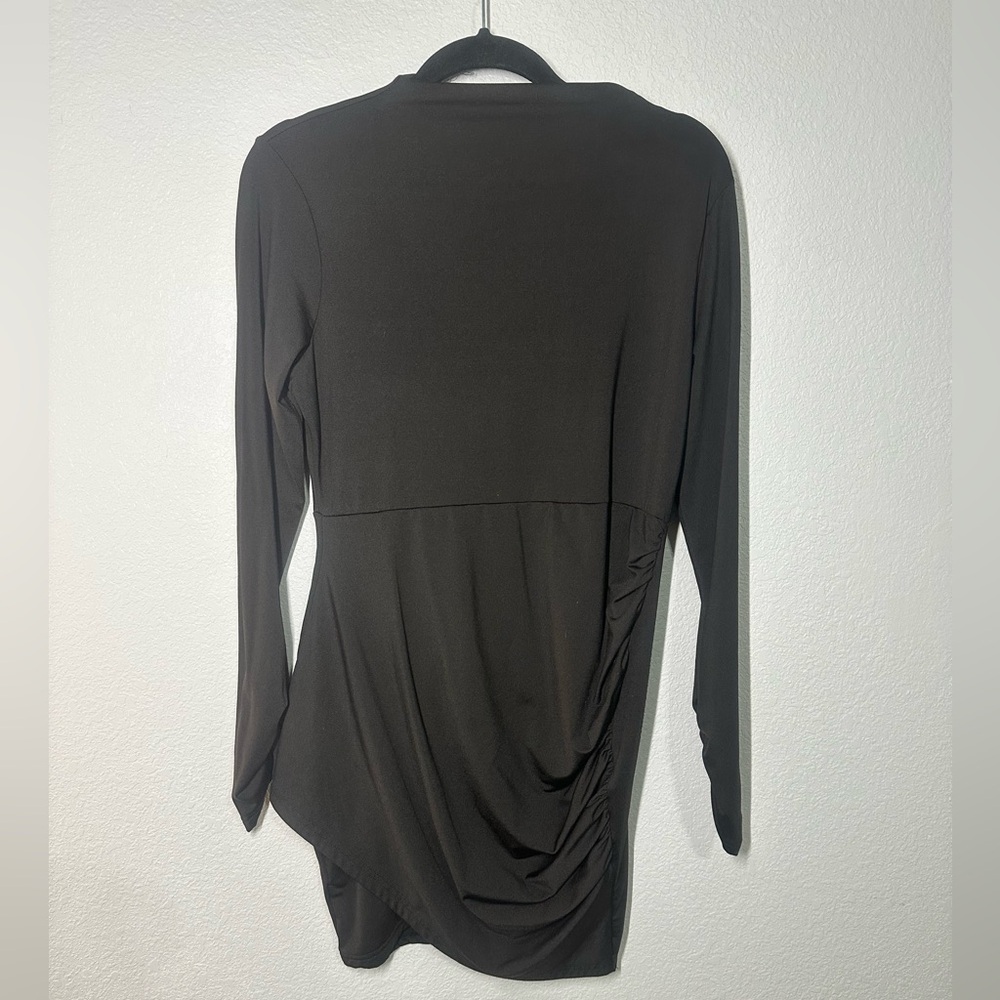 Black bodycon dress perfect for holiday parties and keeps you warm as well